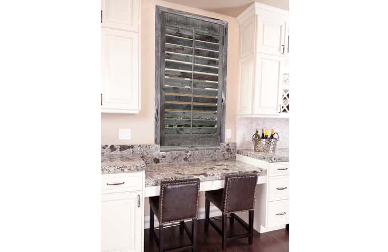 Reclaimed wood shutters on kitchen window in Tampa